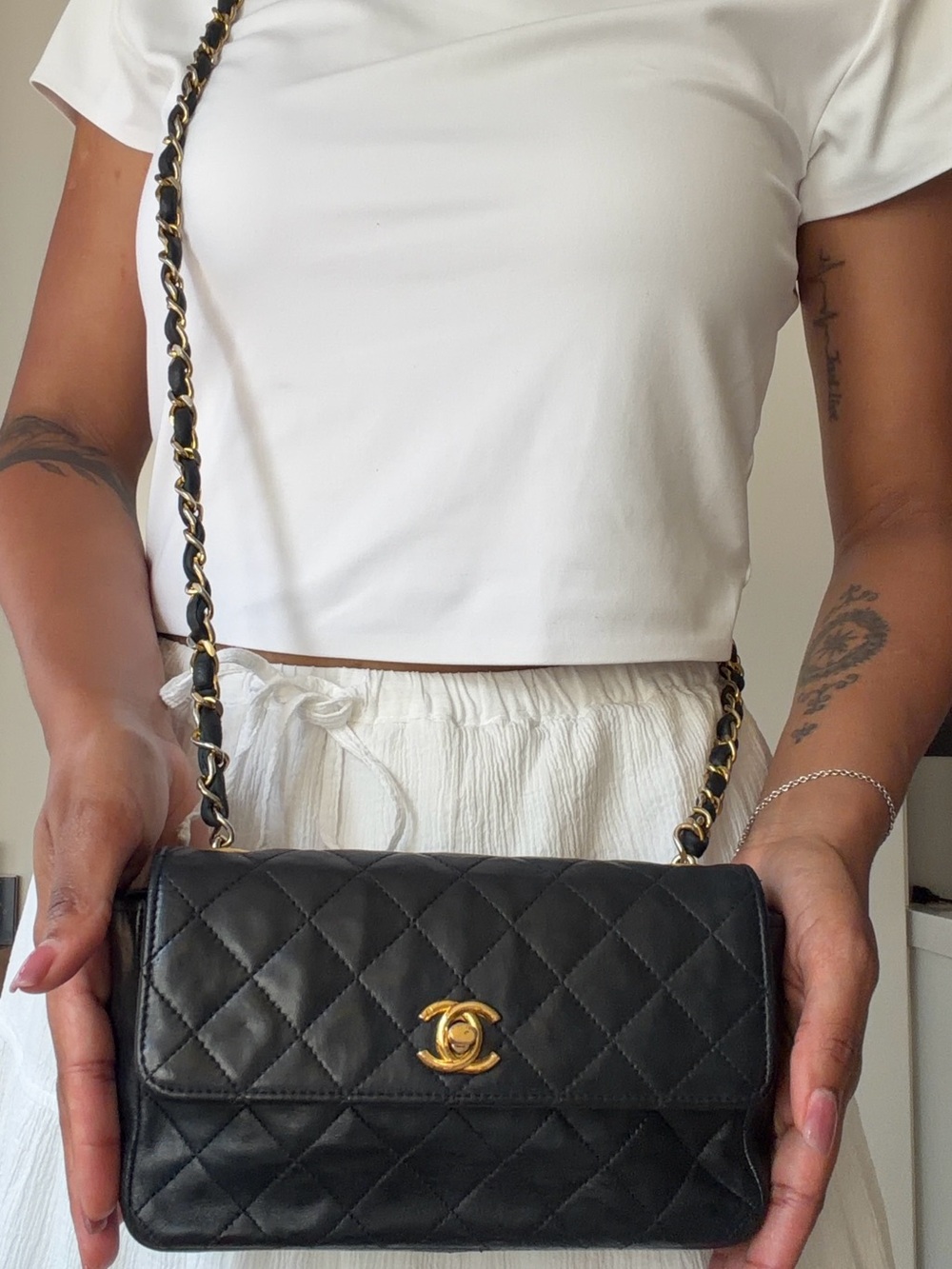 CHANEL Black Quilted Lambskin Crossbody with Gold Chain